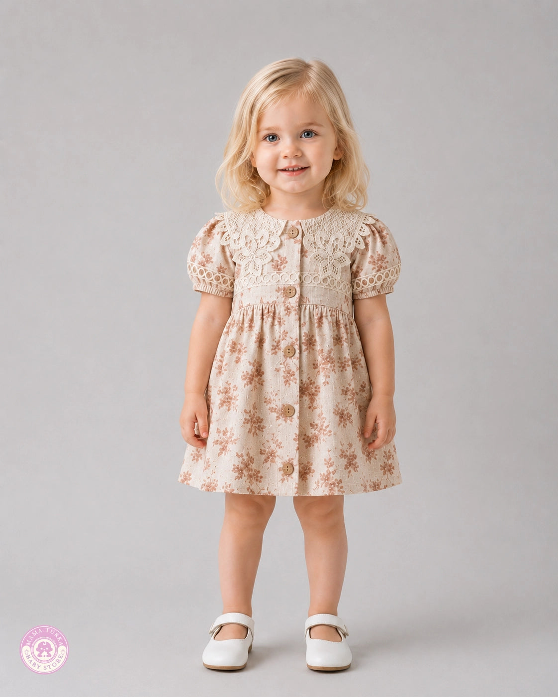 Girl wearing beige floral cotton dress with lace details