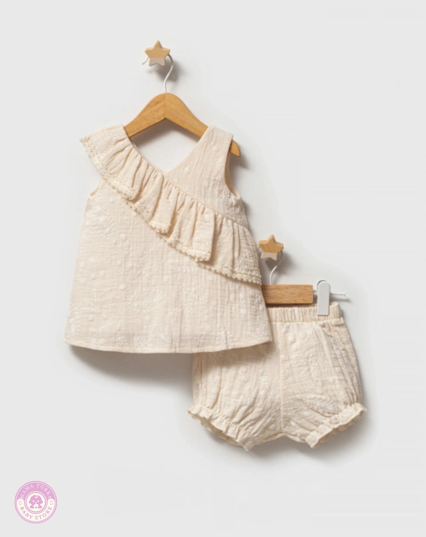 Beige cotton ruffle two-piece outfit set for baby girls with sleeveless top and matching shorts