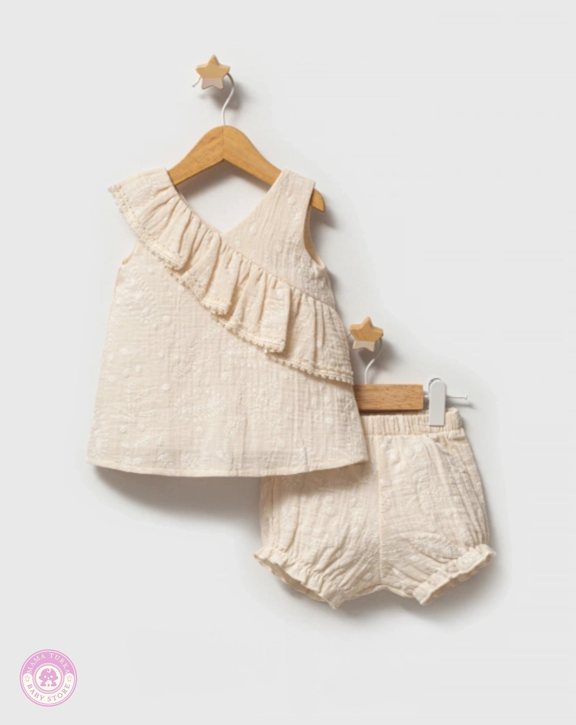 Beige cotton ruffle two-piece outfit set for baby girls with sleeveless top and matching shorts