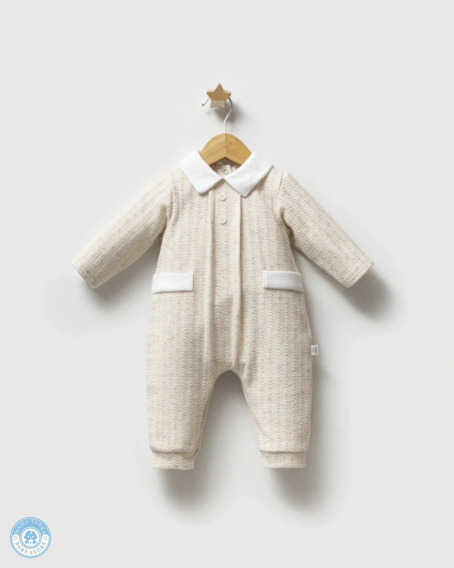 Elegant baby boy romper with classic white collar and soft textured fabric