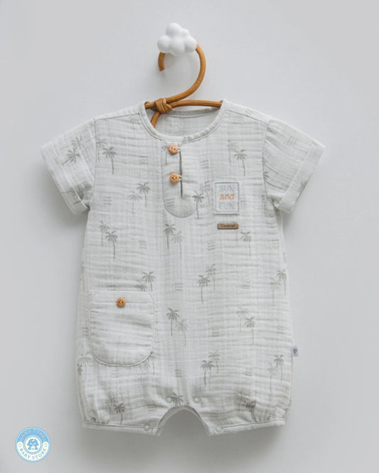 Baby boy summer muslin romper in soft grey with palm print and wooden button details