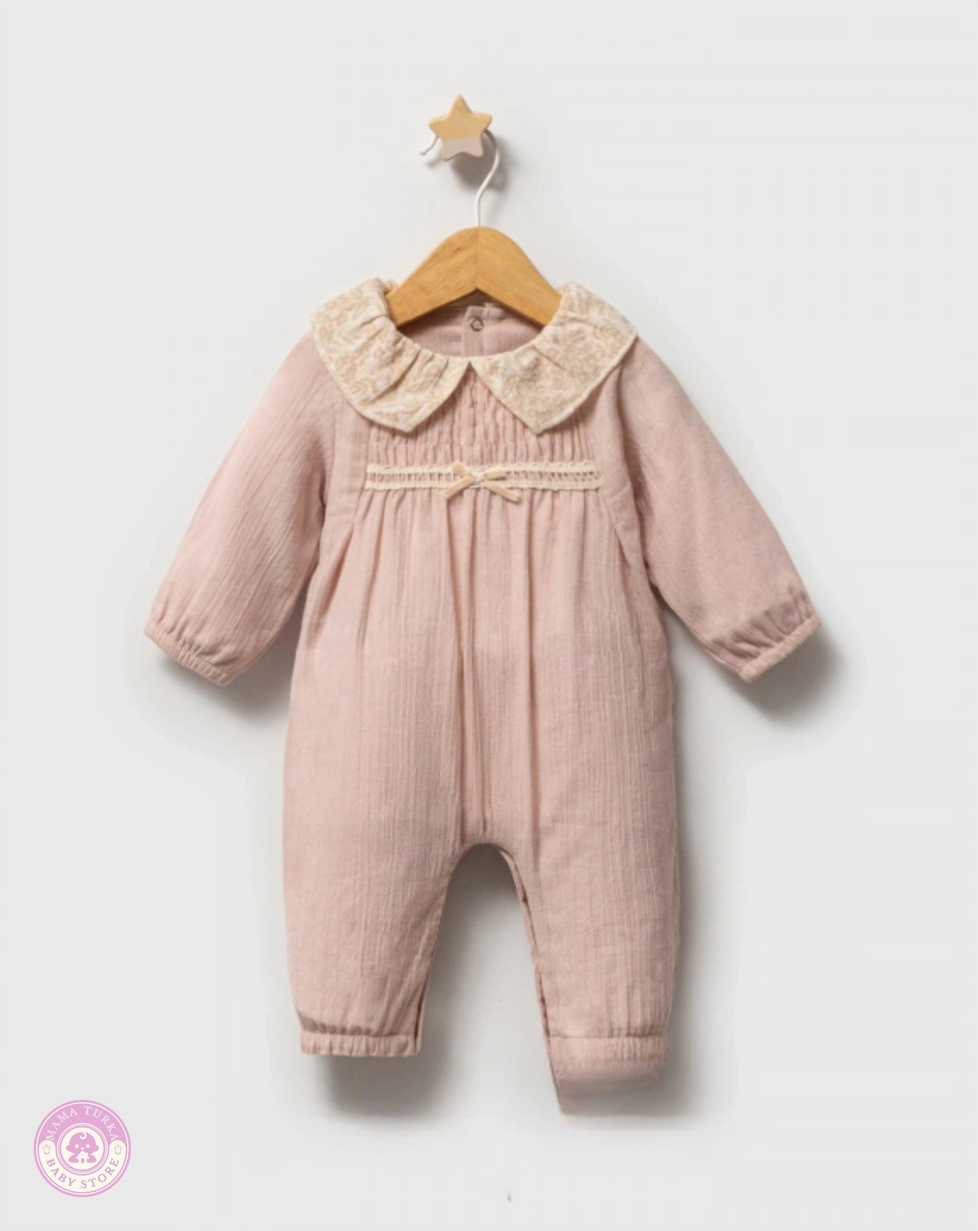Baby girl cotton jumpsuit in dusty pink with delicate collar and soft natural fabric