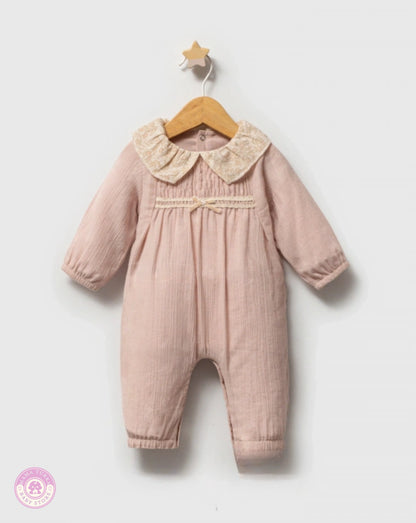 Baby girl cotton jumpsuit in dusty pink with delicate collar and soft natural fabric