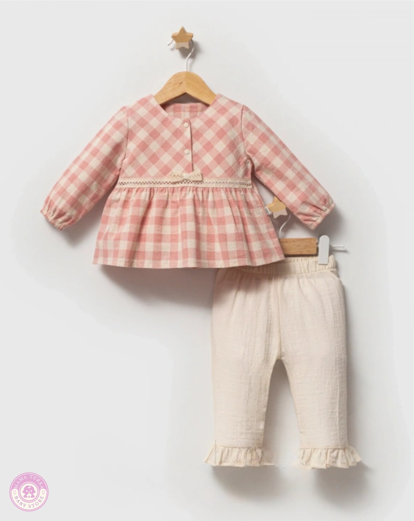 Close-up of plaid cotton top with lace detail for baby girls outfit