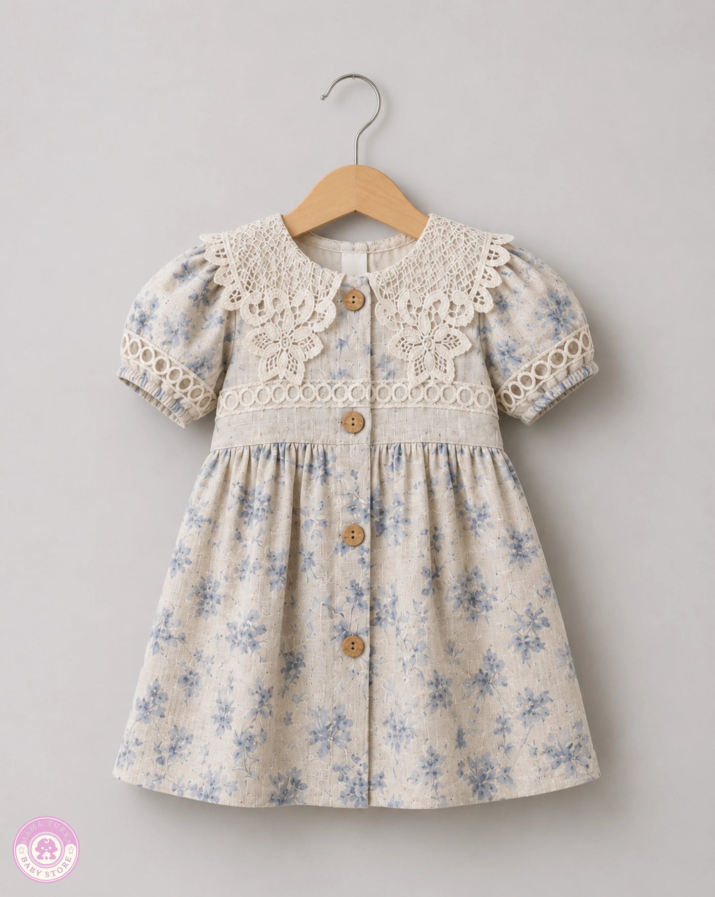 Blue floral girls cotton dress with lace details on hanger