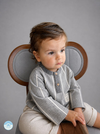 Boy wearing grey cotton set with striped mandarin-collar shirt and trousers