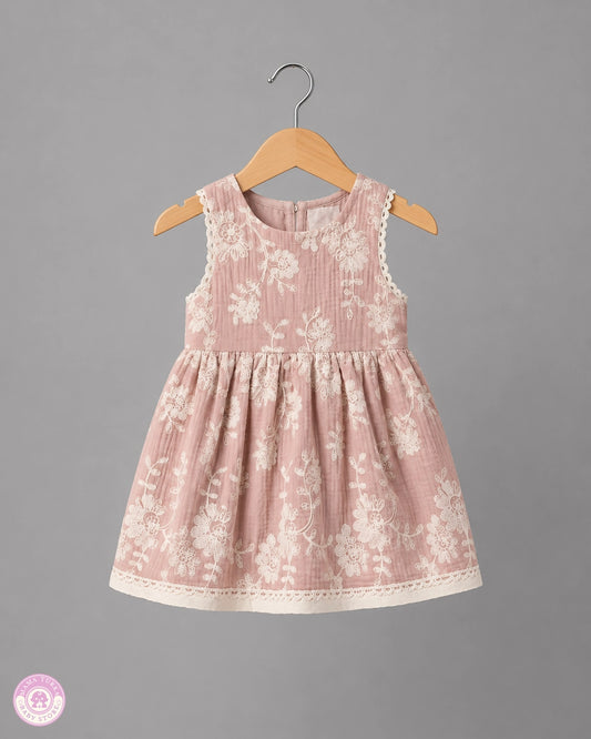 Elegant pink floral embroidered baby girl dress on hanger