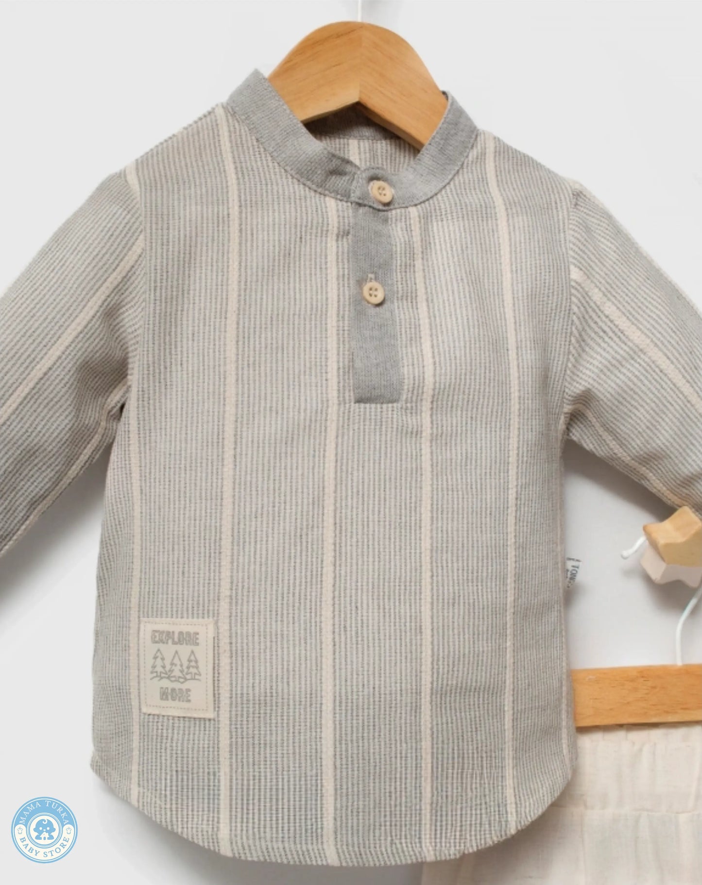 Close-up of mavi blue striped mandarin-collar shirt with button details
