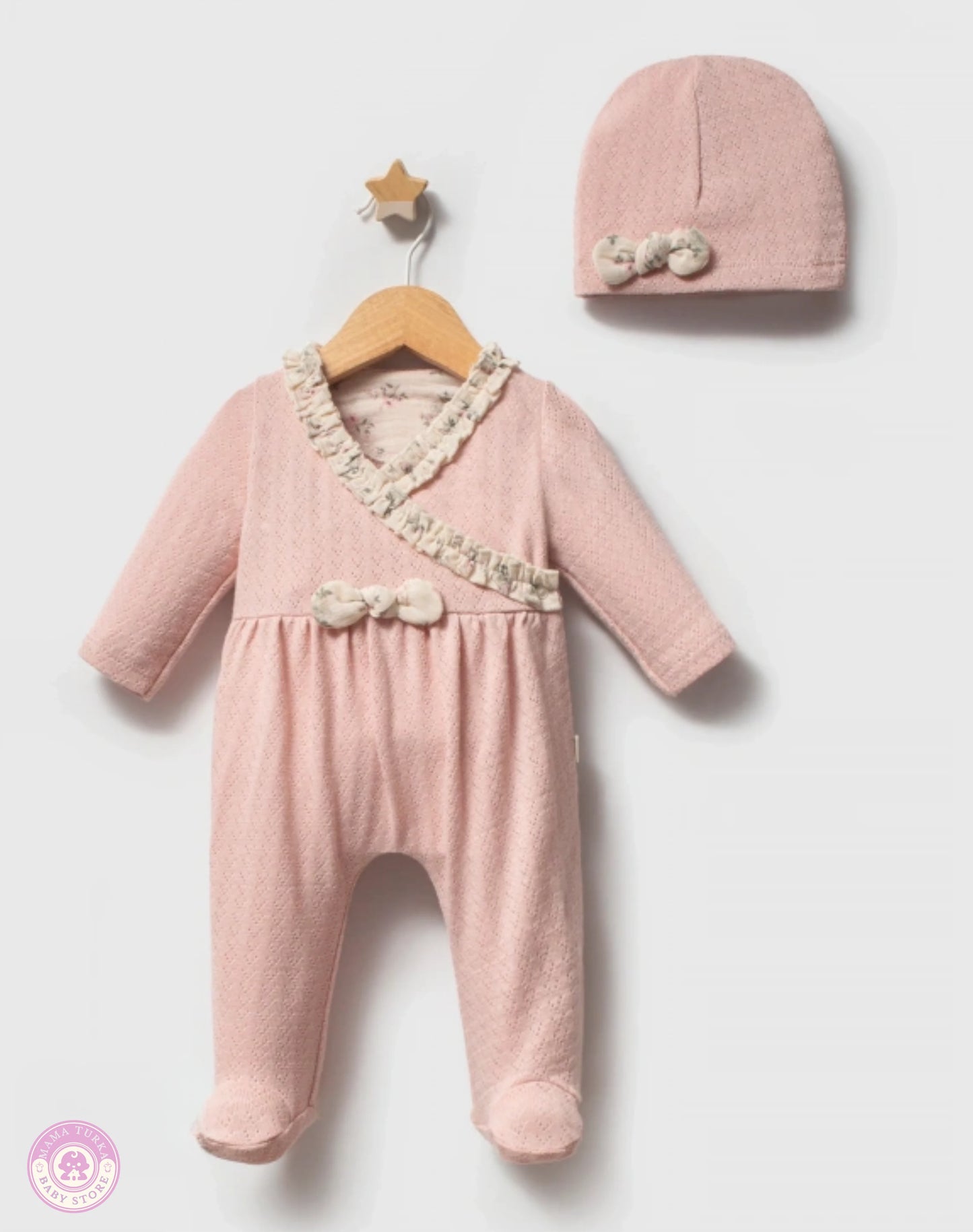 Pink newborn girl set with matching hat on hanger